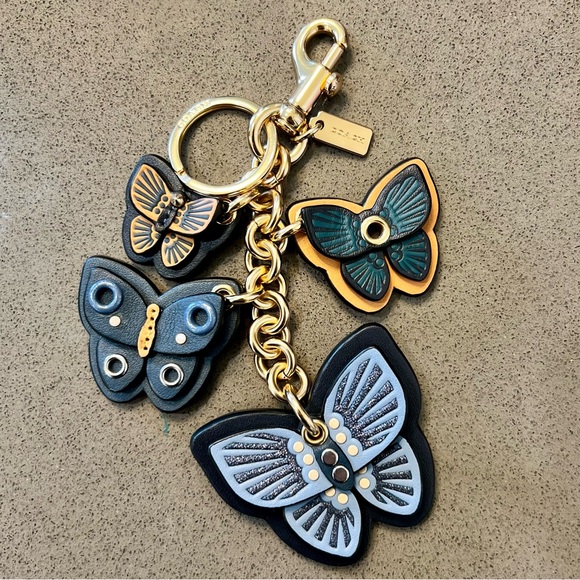 Coach Accessories - Coach Blue Butterfly Cluster Charm